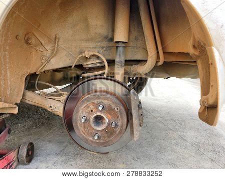 An Old Are Parks In The Garage Waiting For Change A New Tyre In Local Garage Of Thailand Countryside