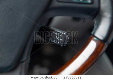 The Shift Lever To Set The Automatic Cruise Control Speed Inside The Car Close-up Located Near The S