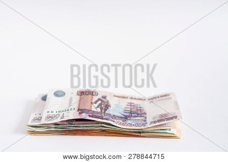 Stack Of Russian Money, Rubel Banknotes On White Background. Loan, Mortgage, Credit Concept, Copy Sp