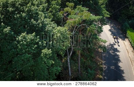 Top Down View Of Two Bicyclists On A Road In Vaals The Netherlands
