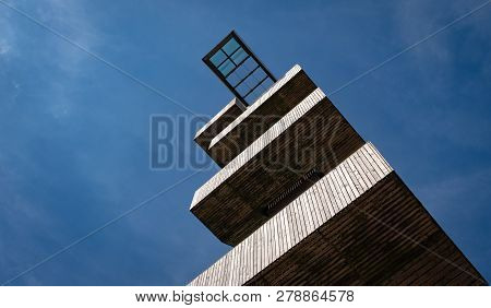 Lookout Platform On A Watchtower Against Blue Sky