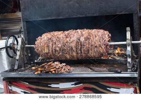 Turkish Cag Kebab On Pole In Horizontal Position