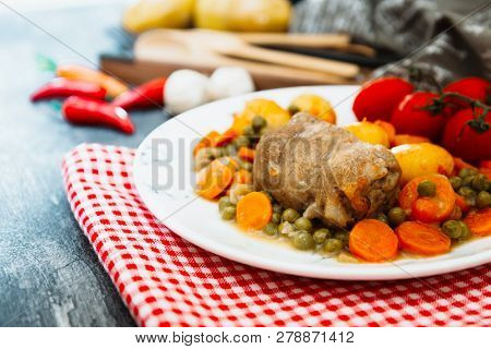 Beef meat stewed with potatoes-Traditional French cuisine Beef Bourguignon potatoes carrots in persillade
