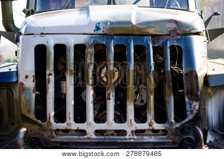 Camouflage Military Truck With Rocket Launcher. Outdoor Military Vehicles Museum. Armor Is Damaged A