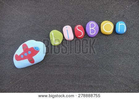 Next Destination, Lisbon City, Portugal With A Composition Of Colored Sea Stones Over Black Volcanic