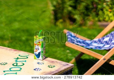 Poznan, Poland - July 29, 2018: Polish Tymbark Apple Juice In A Box Standing On A Table At The Cytad