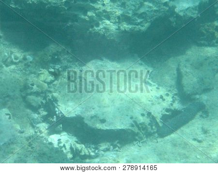 Aquamarine Adriatic Seabed With Daylight Coming Through The Depth Of The Sea.
