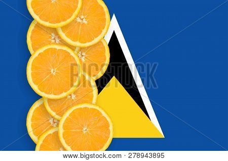 Saint Lucia Flag And Citrus Fruit Slices Vertical Row