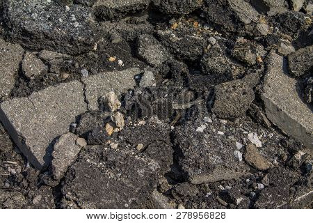 A Pile Of Broken Asphalt Background Texture.