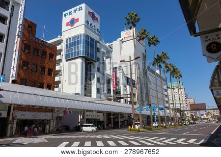 Miyazaki, Japan - November 7, 2018: Tachibanadori street with modern architecture and palmtrees in Miyazaki, Japan 