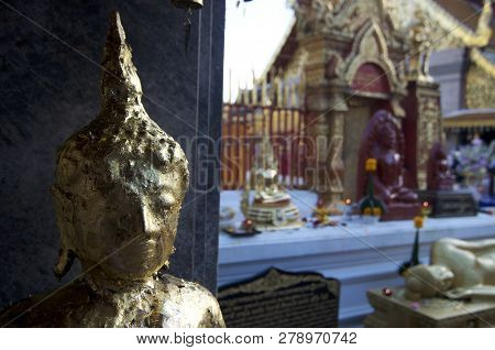 Close Up Picture Of A Buddha Statue That Was Covered With Gold Leaves In The Wat Phra Doi Suthep Tem