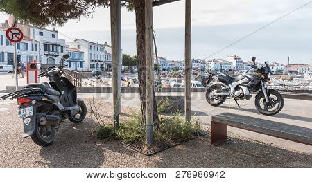 Motorcycle Parked In Harbor Port Joinville On Yeu Island