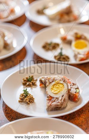 Rabbit Gelantine A With Vegetables On White Plate