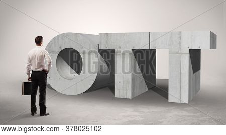 Rear view of a businessman standing in front of OTT abbreviation, modern technology concept