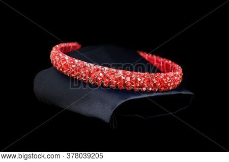 Red Ruby Tiara Gemstones Diamonds Hair Band On Black Background. Jewelry Display Isolated Concept
