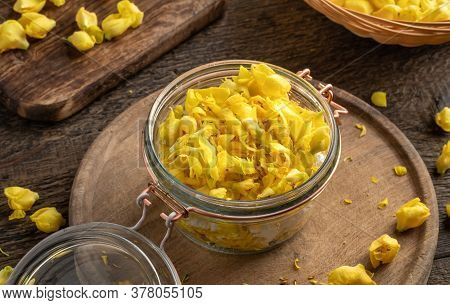 A Jar Filled With Fresh Denseflower Mullein Flowers And Sugar, To Prepare Homemade Herbal Syrup Agai
