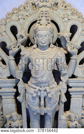 MUMBAI, INDIA - FEBRUARY 14, 2020: Statue of Vishnu from 12th-13th century exposed in the Prince of Wales Museum, now known as The Chhatrapati Shivaji Maharaj Museum in Mumbai, India
