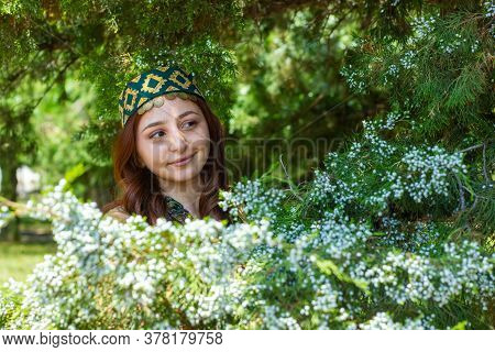Armenian Young Woman In Traditional Clothes In The Forest