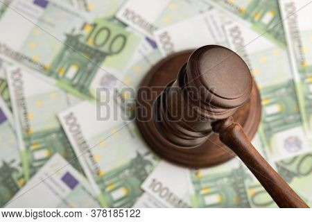 Judge Hammer On Euro Banknotes Background. Judge Gavel On The Money. Corrupt Court