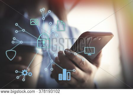 Information Security. Young Woman Using Smartphone Indoors, Closeup