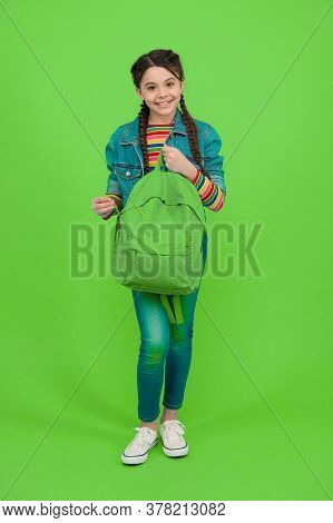 For The Wanderlust In You. Happy Kid Hold Backpack Green Background. Traveling And Wanderlust. Wande