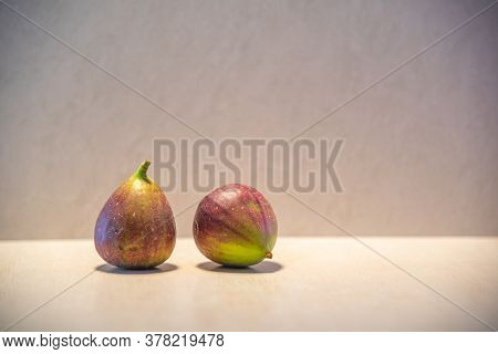 Fresh Figs (ficus Carica L.) On Lighted Background
