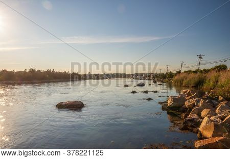 View Of Annaquatucket River, North Kingstown, Rhode Island, On Sunset