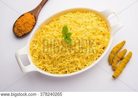 Cooked Turmeric Rice With Curcumin Or Haldi Powder, Indian Food