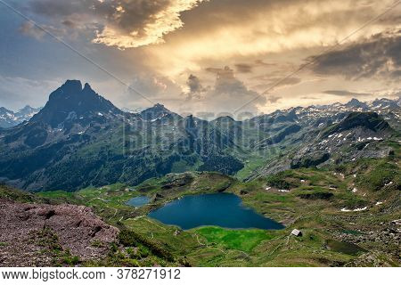 View Of Pic Du Midi Ossau And Ayous Lake In French Pyrenees Mountains