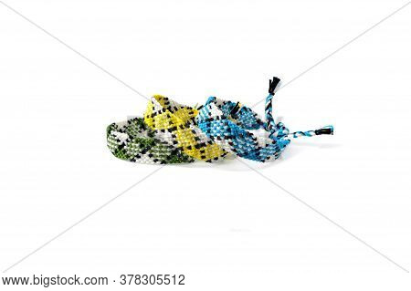 Selective Focus Of Tied Woven Friendship Bracelets With Bright Colorful Pattern Handmade Of Thread I