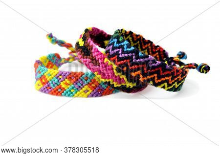 Selective Focus Of Tied Woven Friendship Bracelets With Bright Colorful Pattern Handmade Of Thread I
