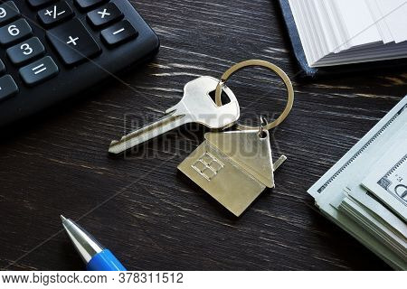 First Time Home Buyer Loan Mortgage. Metal Key And Money.