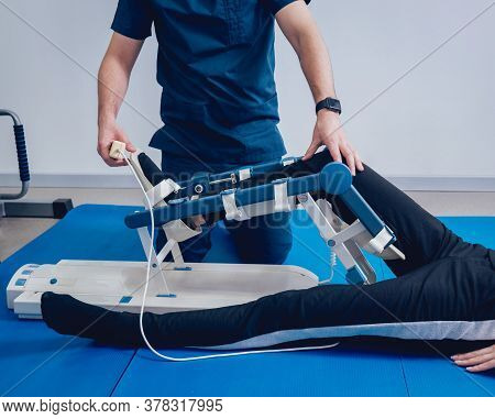 Patient On Cpm Machines. Continuous Passive Range Of Motion.