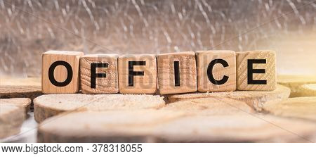 Wooden Blocks With The Word Office. Business And Finance Concept.