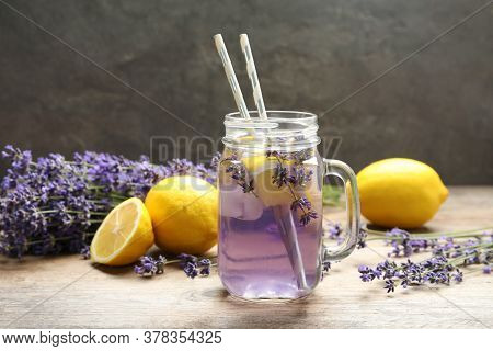 Fresh Delicious Lemonade With Lavender In Masson Jar On Wooden Table