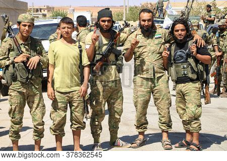 Aleppo, Syria 12 Desember 2017\nfighters In The Armed Syrian Opposition Raise The Hands Of Victory A