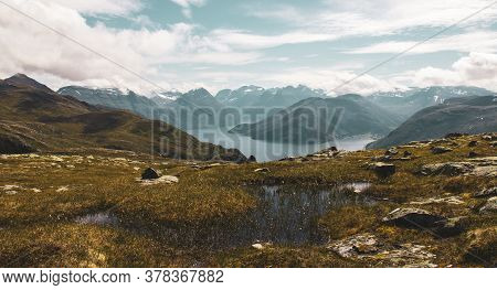 Norwegian Fjords From The Top Of A Desolate Mountainrange