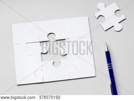 Fill The Missing Parts Fragment Of White Jigsaw Concept Puzzle For Business With Completing The Team
