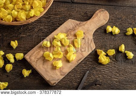 Denseflower Mullein Flowers On A Cutting Board, Top View
