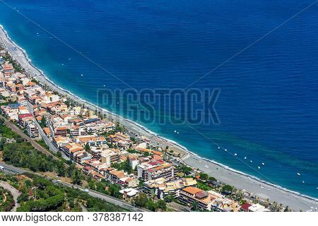 Sicily. Ionian Sea Cost Line View From Top On Santa Teresa Di Riva In Sunny Summer Day. Blue Sea, Be