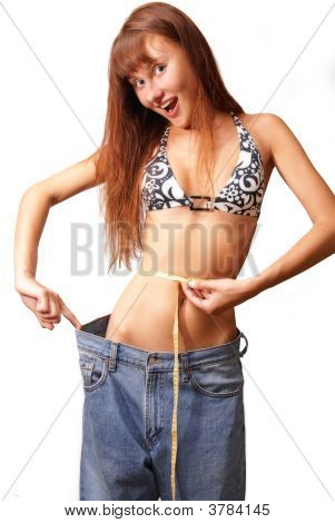 Flicka försöker Jeans