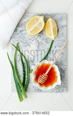 Facial Treatment Preparation. Simple Homemade Facial Mask And Spa Products, Honey, Lemon, Aloe Vera 