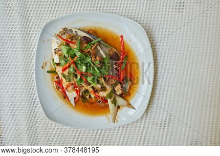 Steamed Butterf Fish (silver Pomfret)with Soy Sauce In White Dish, Top View