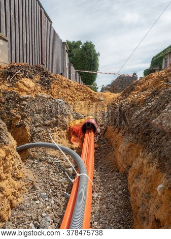 Repair Work On City Street. Laying Cable. Wire In Hdpe And Protectivep Tube. Building Of Lines Of Me