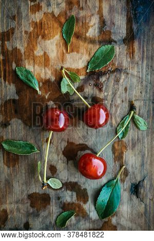 Ripe Cherries On A Wooden Windowsill. Cottagecore Aesthetics. Rustic, Vintage Style Juicy Summer Con