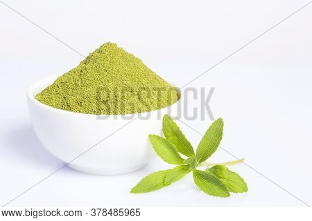 Fresh Green Stevia Herb And Extract Powder - Stevia Rebaudiana. White Background