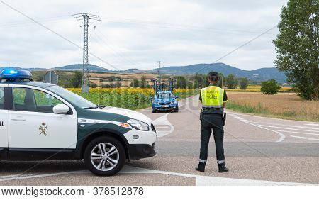 Burgos, Spain - July 28 - 2020: Civil Guard Controlling And Waiting For The Tour Of Burgos 2020 In T