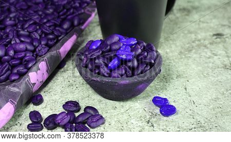 A Clay Pot With Coffee Beans On A Concrete Board