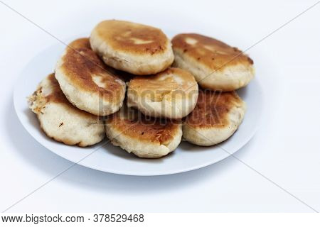 Traditional Homemade Fried Patties Or Pies Made Of Yeast Dough In A Rusticstyle On White Plate