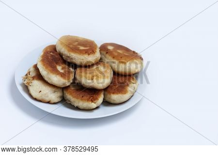 Traditional Homemade Fried Patties Or Pies Made Of Yeast Dough In A Rusticstyle On White Plate